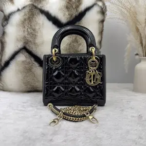 Pre-owned Dior three panel black and gold patent leather Princess 866