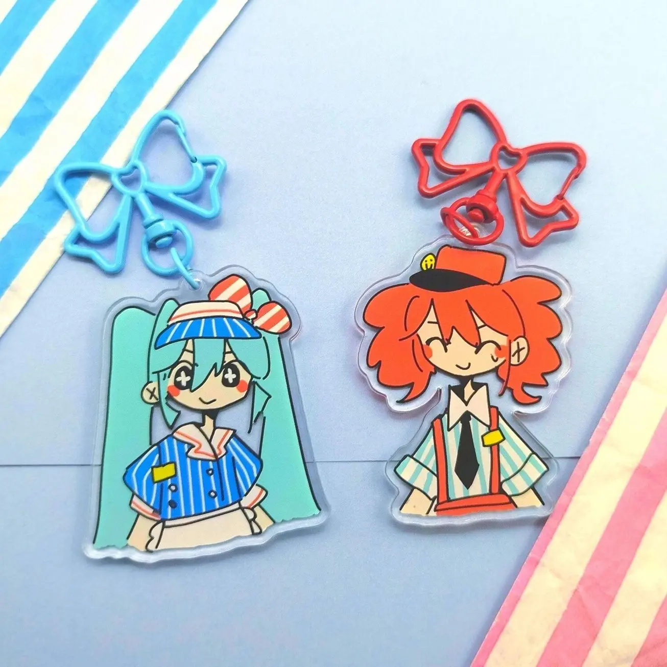 2 ops miku and teto mesmerizer keychains