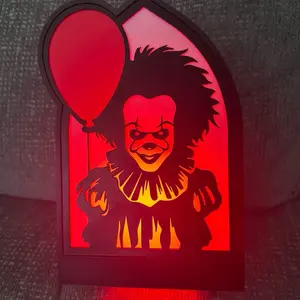 Pennywise Light Box with Red Balloon Design and eerie Silhouette Featuring a Clown