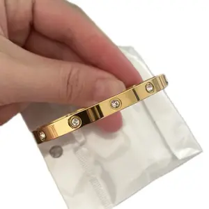 Stainless Steel Gold Bracelet with Embedded Gemstones for Everyday Wear