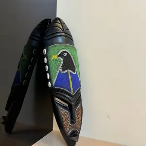 Nguzo Bird Beaded Mask - Handcrafted African Art with Vibrant Colors and Detailed Beadwork for Cultural Decor