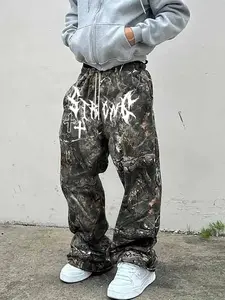 Y2K street - style men's winter straight sweatpants, Camouflage Pants, full jungle camo print is fashionable, white Gothic letters and cross patterns are mysterious and personalized. Combined with warm layers in winter, showing trendy taste for street
