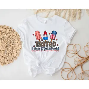 Women's Independence Day celebration, American patriotism, summer fun Graphic T-Shirt - Short Sleeve Crew Neck Regular Fit Casual Wear | Soft & Breathable Fabric, Durable Print, Everyday Comfort, Machine Washable, retro trendy, patriotic, casual flat lay