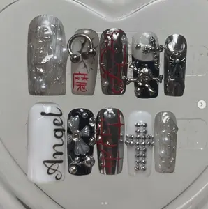 Bold and Edgy: Angel and Cross-Inspired Nail Art with Red, Black, and Silver Accents"