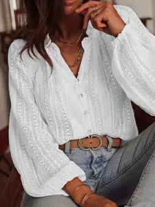 A new spring and autumn loose casual fashion versatile hollow lace V-neck single-breasted long-sleeved women's top shirt blouse
