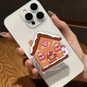 Christmas MagSafe Phone Grip. Gingerbread Library Kindle Grip, A phone grip shaped like a cozy house, a Christmas present