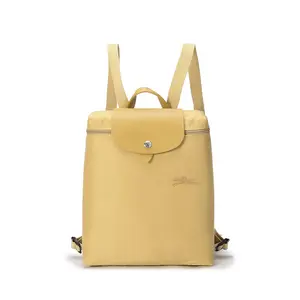 Longchamp Le Pliage Green 26 Eco-Friendly Zippered Flap Adjustable Strap Canvas Backpack For Women In Yellow Lightweight Casual Daypack Cute Stylish Daypacks