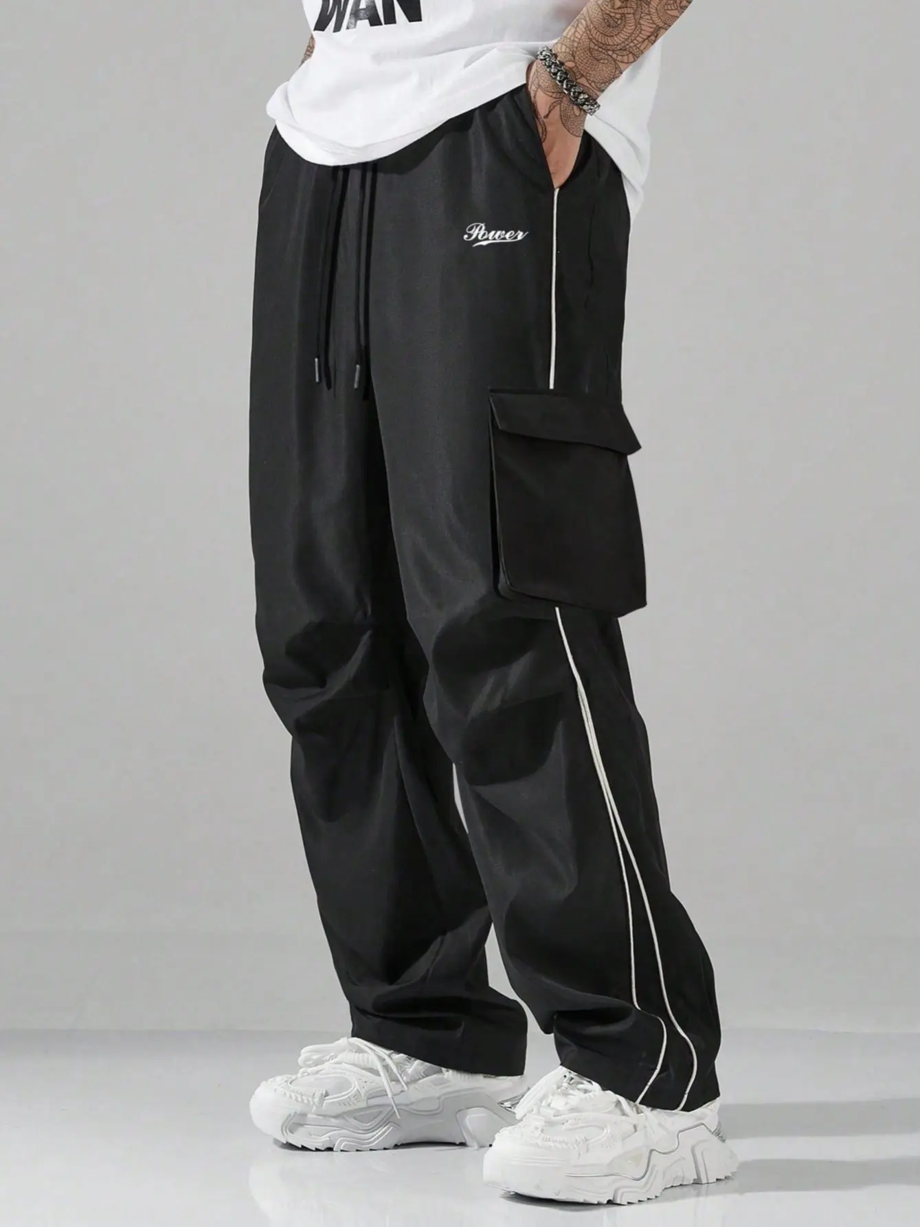 Men's Streetwear Cargo Track Pants - Casual Sportswear Fabric with White Side Stripes, Large Pocket and Logo Detail, Activewear, Cargo Pockets Men's Pants, Relaxed Fit, Black Stripes Men's Pants