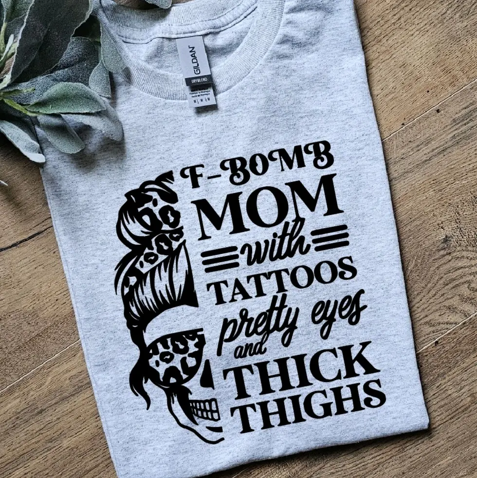 cute f bomb mom with pretty eyes and thick thighs popular skulls momlife humor tee