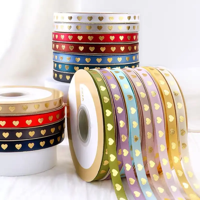 1cm Wide Dense Heart Printed Ribbon. Fray-resistant, tough and easy to shape. Perfect for gift wrapping, bouquets, cake decor, crafts and home decoration. Ideal for Father's Day, parties and all festivals.