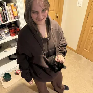 Cat in pouch 2