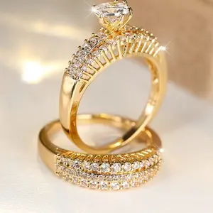 A Set of Two Detachable Couple Engagement Rings Made of 18K Gold-Plated Copper, Featuring Sparkling Synthetic Zirconia, Suitable for Everyday Wear by Both Men And Women.