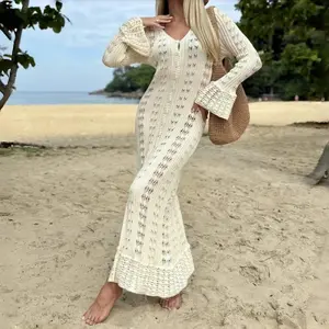 Women’s openwork cardigan sweater with a V-neck and bell-shaped sleeves, featuring a unique wide, relaxed fit and a swing design GARMENTARY
