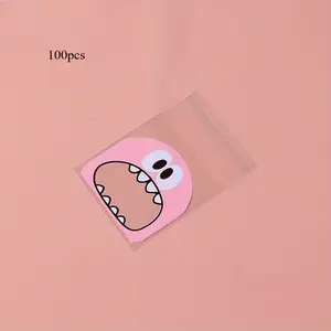 100pcs Cartoon Graphic Packaging Bag, Transparent Resealable Packaging Bag for Biscuits, Self Sealing Plastic Bags, Snacks, Nuts, Seeds, Candy, Gifts, Jewelry, Food Storage Package Pouches, Reusable Produce Bags, Home Kitchen Supplies