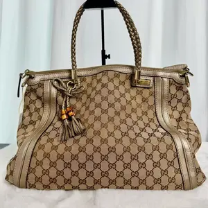 Pre-owned GUCCI Bella GG Monogram Metallic Pebbled Leather Bamboo Tassel Tote Bag|20730718
