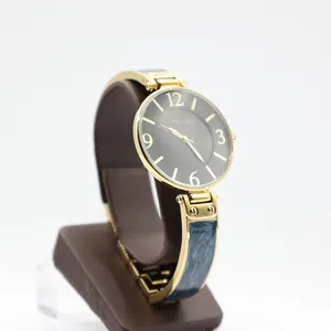 Anne Klein Large Round Navy Blue Watch with Gold Tone Trim and Navy Blue Marble Style Band