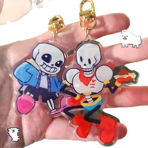 Sans and Papyrus Skeleton Keychains - Acrylic Glitter Epoxy with Gold U-Shaped Clasp
