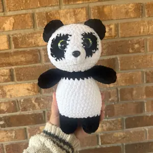 Handmade crochet shifting eyed panda plushie