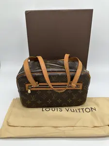 Pre-owned Coated Canvas and Vachetta Leather Shoulder Bags Louis Vuitton Cite MM Shoulder bag in Monogram Coated Canvas and Vachetta Leather