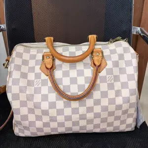 Pre-owned Louis Vuitton LV Speedy 30 Handbag with Checkered Pattern and Furry Pom Pom Accessory