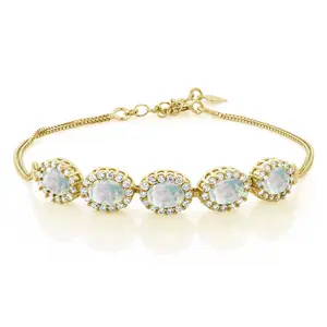 Gem Stone King 5-Stone Halo Gemstone Birthstone Bracelet for Women | 18K Yellow Gold Plated Silver | Oval 7X5MM | 7 Inch + 1.5 Inch Extender | Gifts for Mom Wife Her