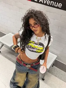 Never Follow The Crowd' Grillz Lips White Crop T-Shirt | Casual Streetwear Top | Premium Soft Fabric | Bold Edgy Grunge Aesthetic | Trendy Slim-Fit Cropped Cut | Eye-Catching Lips & Slogan Print | Versatile Daily Wear | Perfect for Grunge/Street Style Fan