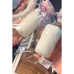FROZEN BUTTER sensation! 1Pc Handmade Squishy toy - rice cake tube shaped to relieve stress - Food grade silicone