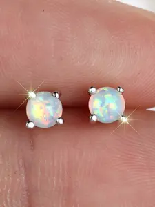 A classic round four-pronged synthetic opal ear stud, suitable for European and American fashion styles, featuring a trendy and petite design, perfect for ear cartilage earrings, Stud Earring Jewelry