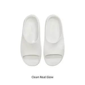 Soft cream white sleek slides made of waterproof foam. Cushioned spiral insole plus anti-slip grip for all scenes. Light unisex slip-ons dry rapidly, ideal for gym, shower and beach with pure fresh summer aesthetic.