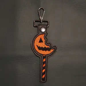 Sam’s Lollipop- Trick r Treat - bag / purse clip