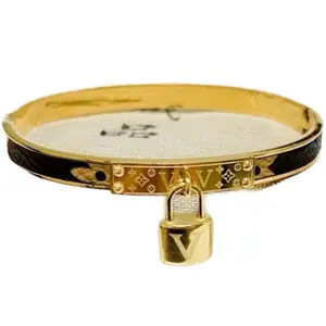 Elegant Heart Shape Titanium Steel 18K Gold Plated Bangle with Lock Charm and Black Enamel Accents