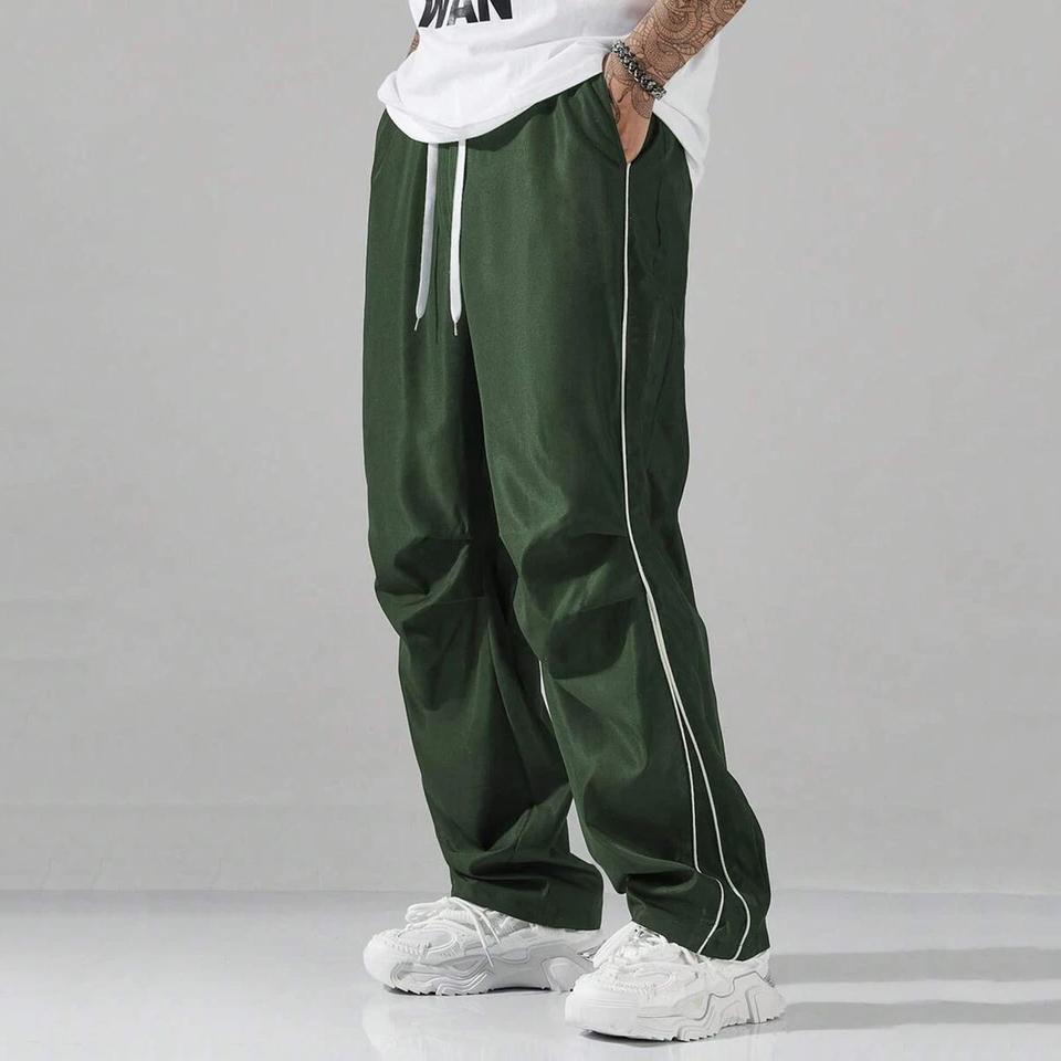 Unisex baggy wide-leg sweatpants; men’s casual athletic pants made from soft fabric with an elastic waistband and drawstring; loose fit with side stripes; breathable, lightweight sports fitness streetwear pants; all-day comfort and versatile for everyday