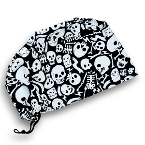 Tossed Skulls Skull tie-back style surgical scrub cap for men by Paradise Caps. Glows in the Dark!