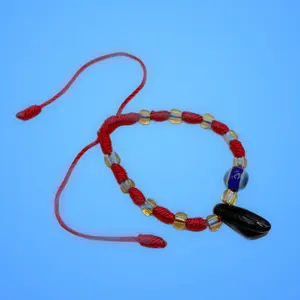Baby red evil eye protection bracelet with figa