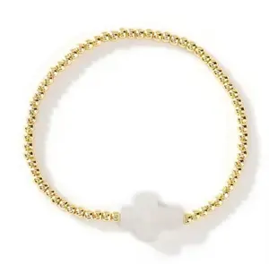 GOLD BEADED CROSS BRACELET