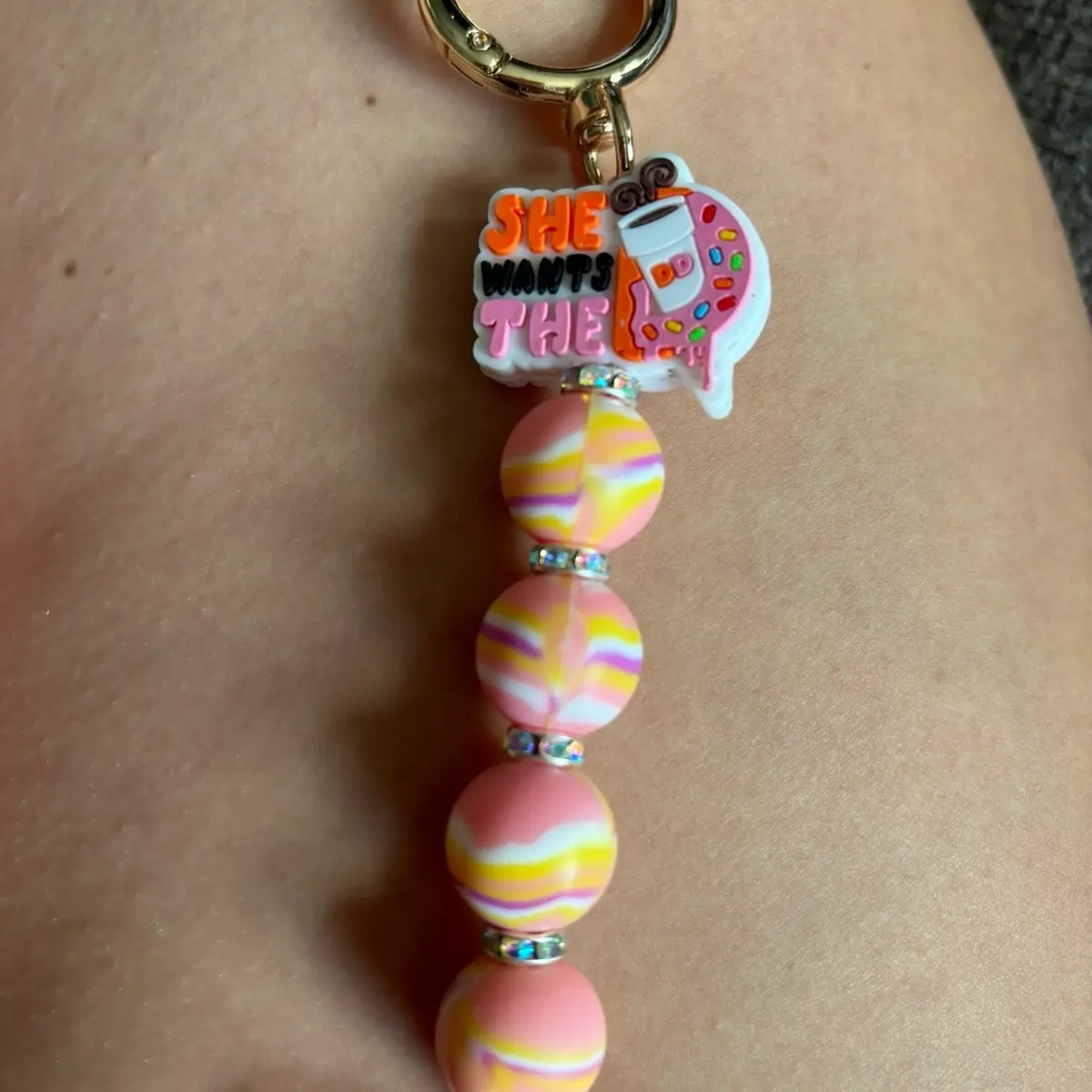 She wants the Dunkin keychain.