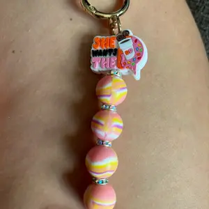 She wants the Dunkin keychain.