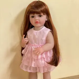 22-inch reborn doll, golden long hair, pink dress – handcrafted, lifelike princess doll, comes with a complete set of accessories including a bottle, birth certificate, and pacifier—perfect gift