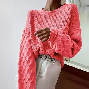 Textured bubble sleeve sweater in vibrant coral pink, featuring a relaxed fit and cozy knit, perfect for bold yet comfy everyday looks-D240167