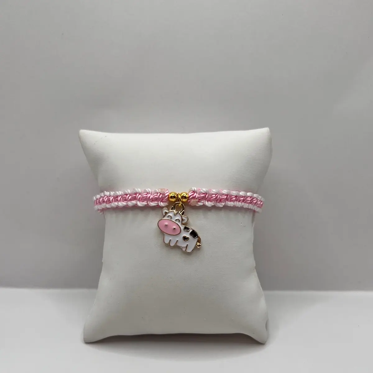 Pink cow bracelet