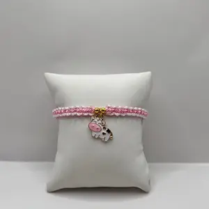 Pink cow bracelet
