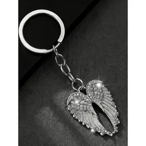 Vintage Distressed Angel Wing Keychain Pendant, A Niche Light Luxury Style Metal Charm With Sparkling Textured Details, Can Be Used As A Key Holder Or Bag Accessory, Suitable For Daily Commuting, Dating, Or Gifting.
