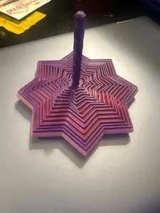 Hypnotic Star Spiral Fidget  Mesmerizing Desk Toy & Stress Reliever