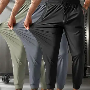 silk material sports pantsFeaturing a drawstring elastic waistband with a zipper pocket; the fabric has high elasticity, quick-dry properties, and a soft, skin-friendly feel.Great for indoor sports and summer outdoor activities. must-have plain