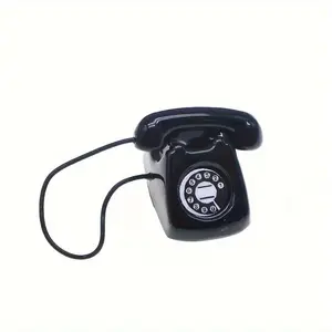 Two miniature vintage rotary phone models- alloy metal decoration, red and black color scheme with white accents, realistic dial and cord, suitable for dollhouse accessories, scene props, collection
