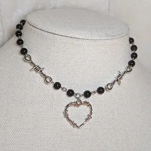 Barbed wire with barbed heart pendant choker necklace Barbed wire with barbed heart pendant choker necklace