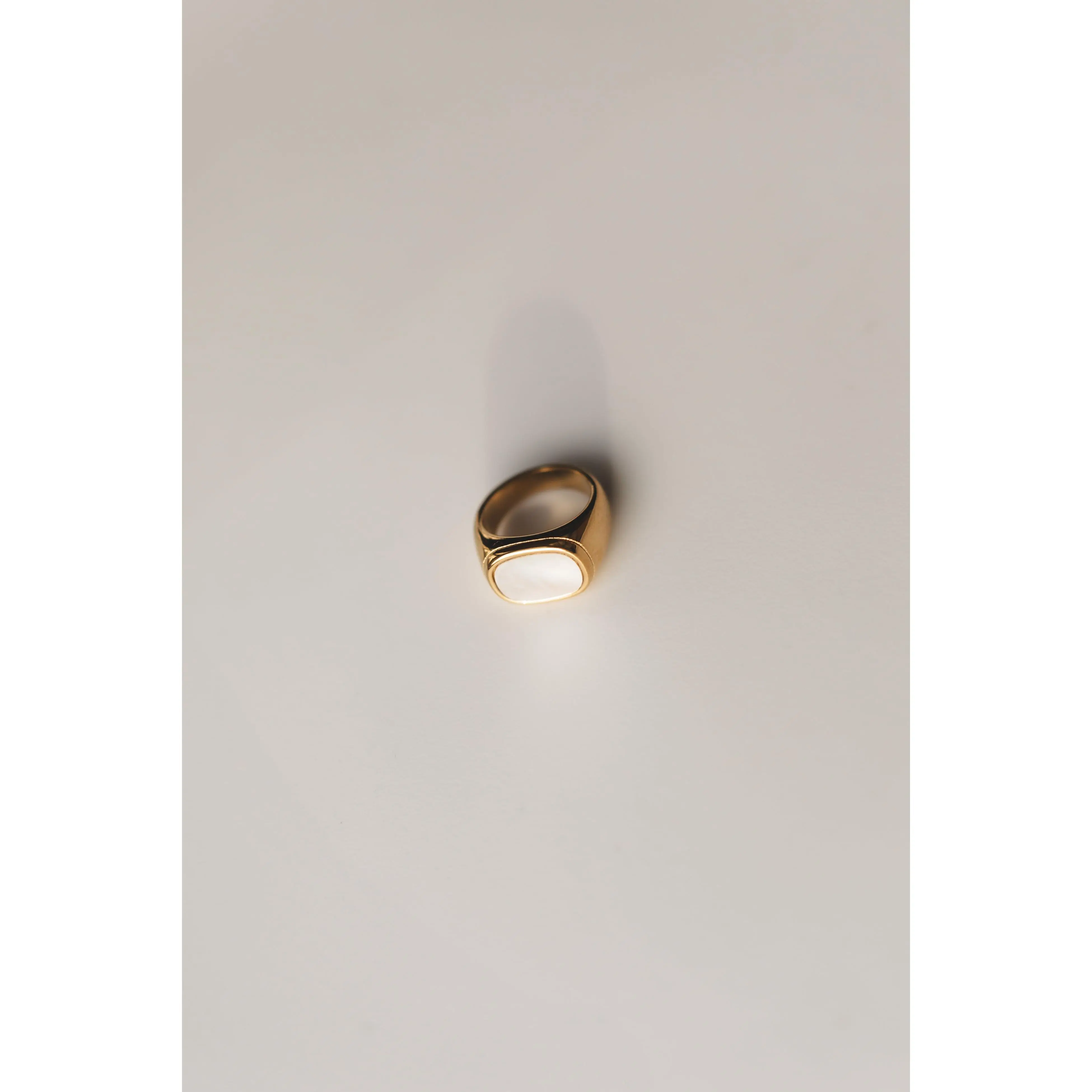 Gold Pearl Ring - Elegant Design with Gold Finish and Simple Band