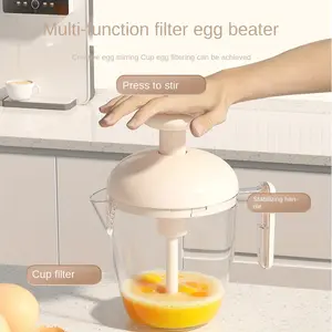 Multifunctional press whisk for effortless egg preparation—a handy kitchen essential