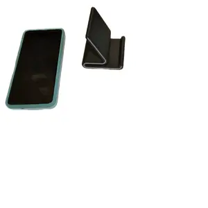 3D-printed mobile phone stand. Accessories for smartphone mounting. Aesthetic Cellphone
