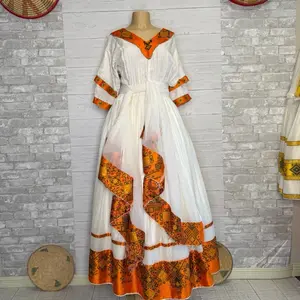 Ethiopian and Eritrean Traditional Dress with Orange and White Patterns